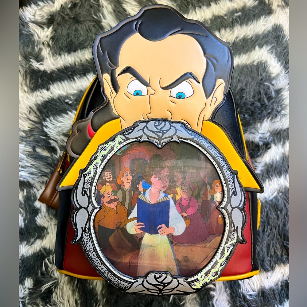 LOUNGEFLY DISNEY VILLAINS GASTON LENTICULAR MINI BACKPACK NWT